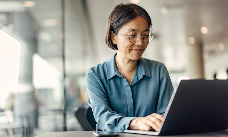 Asian woman using a laptop